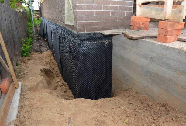 Happy homeowners after waterproofing job in Woodland